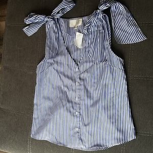 Blue/white striped, sleeveless top with should tie